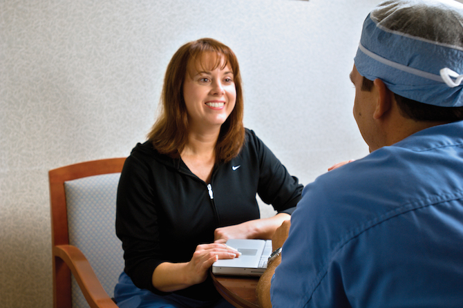 patient speaking to a nurse